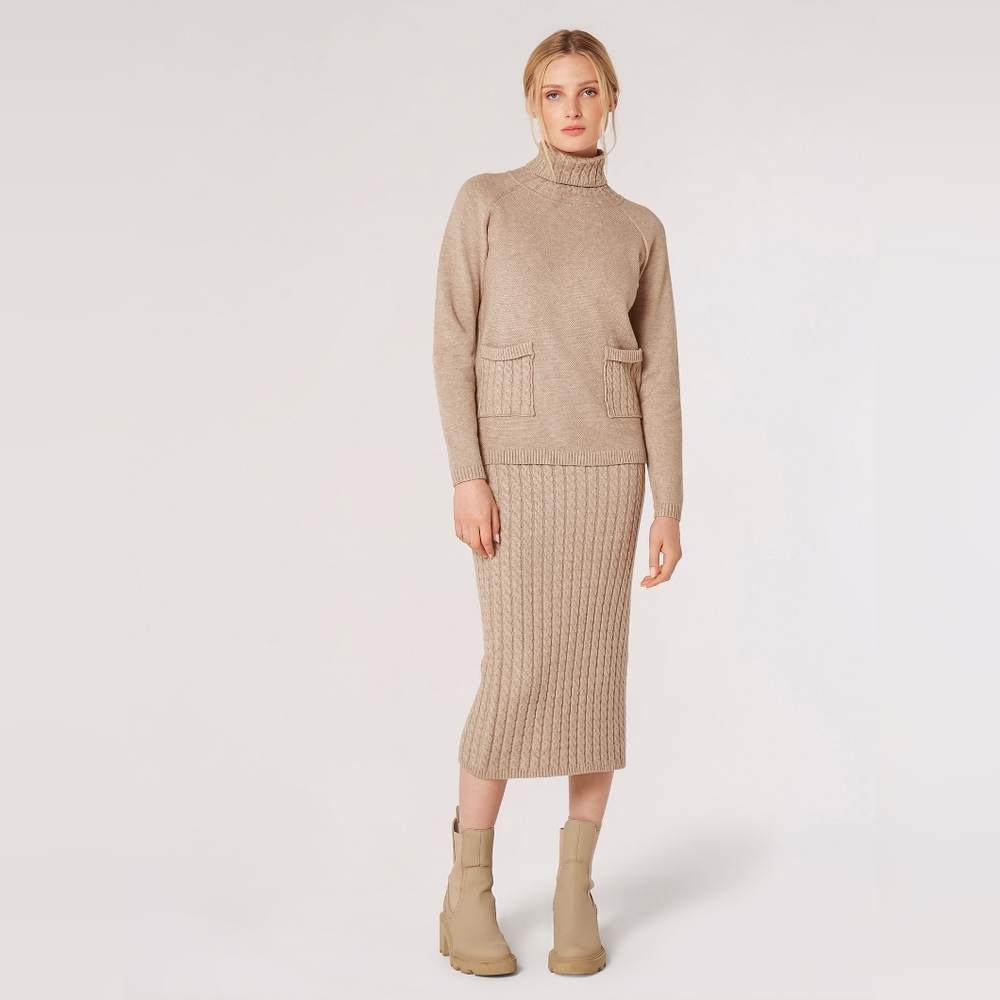 Sweater with cable turtleneck and pockets